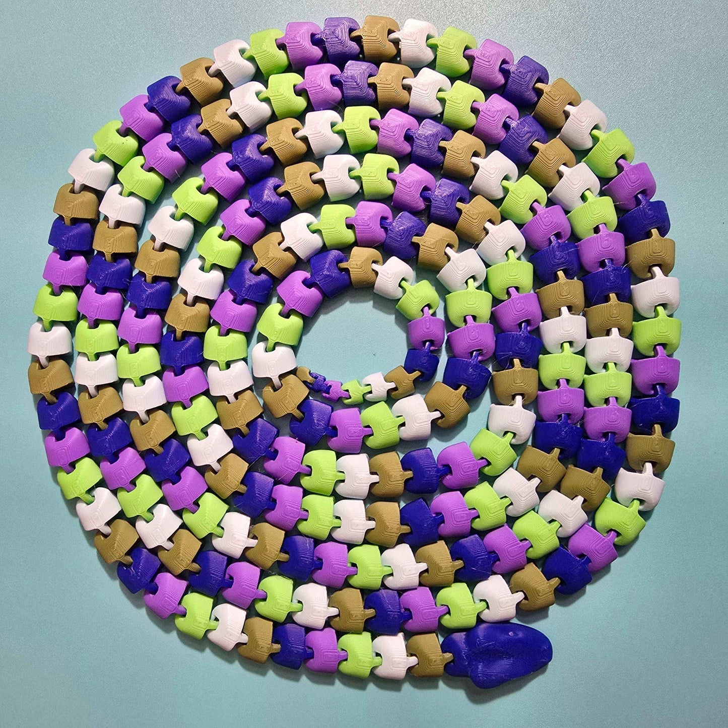 The Snek of Unreasonable Length | 10ft Articulated Snake Figurine - Impishly Yours