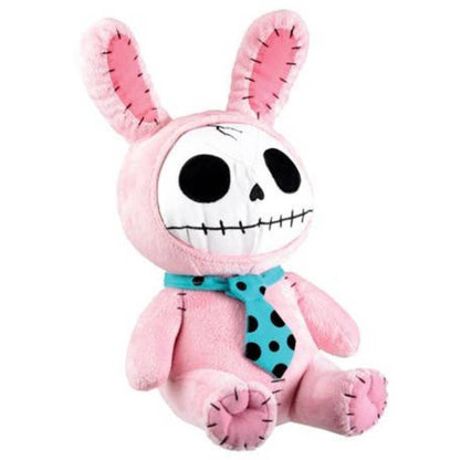Pink plush bunny with stitched black skeleton face and teal scarf with black polka dots.