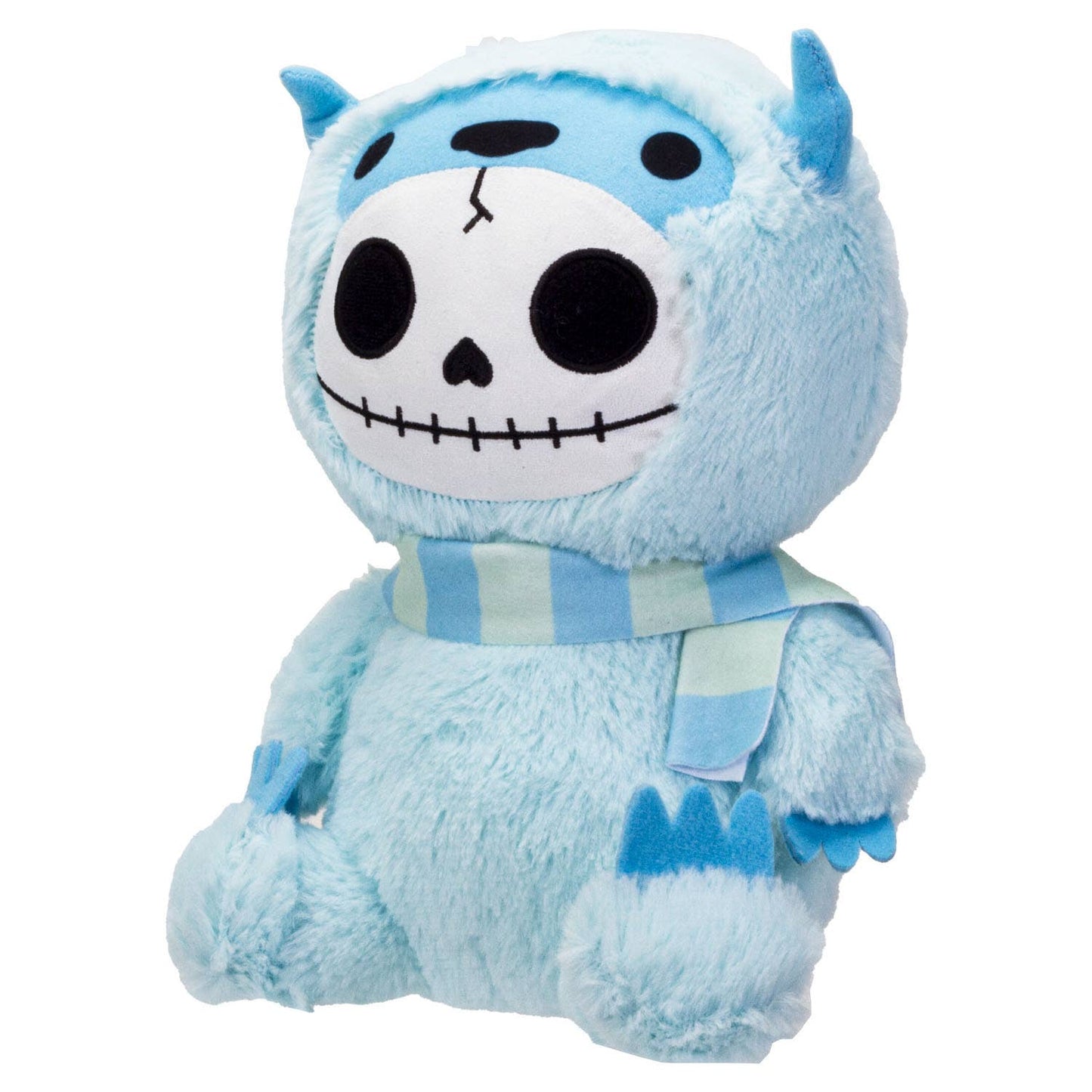 Blue furry plush toy shaped like a yeti with a skull face and striped scarf.