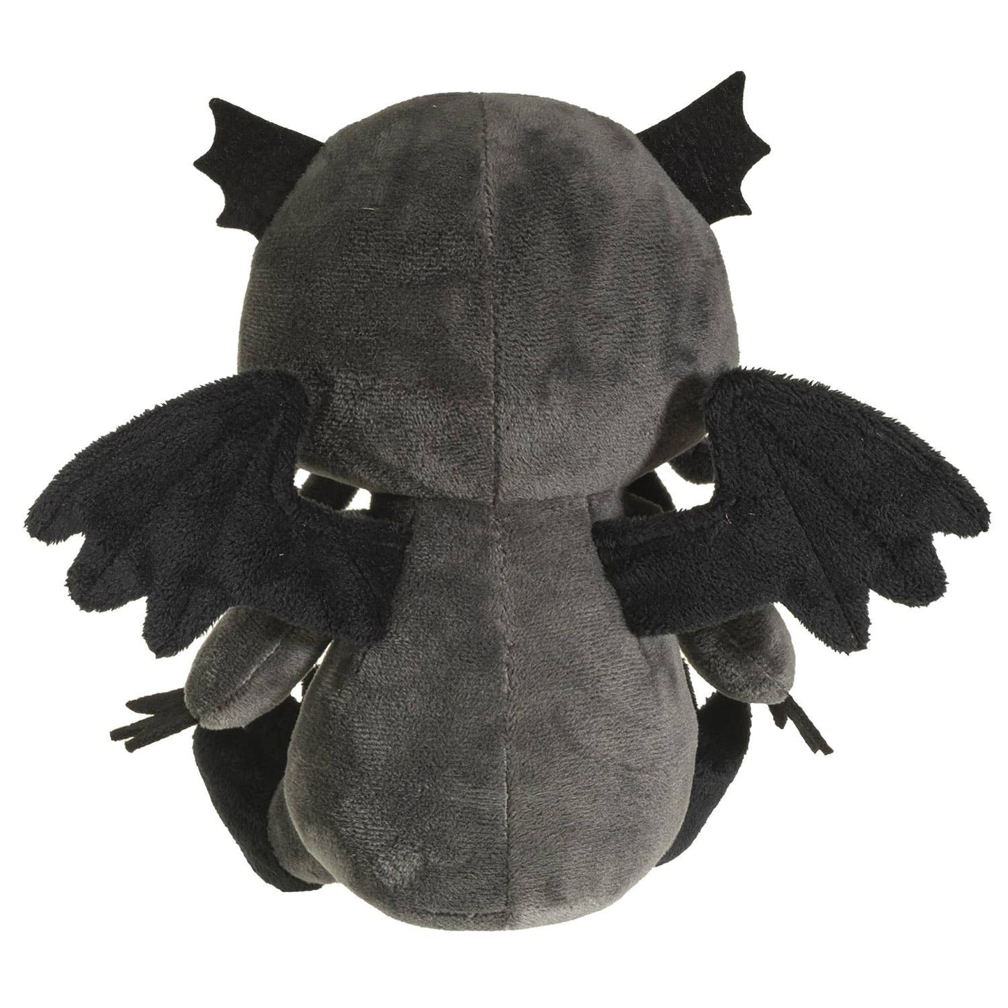 Dark gray plush Cthulhu with black wings and fin-like ears, viewed from behind.
