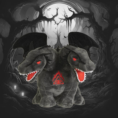 Dark gray double-headed dragon plush with red eyes, open mouths, wings, and a red triangular symbol on chest against a.