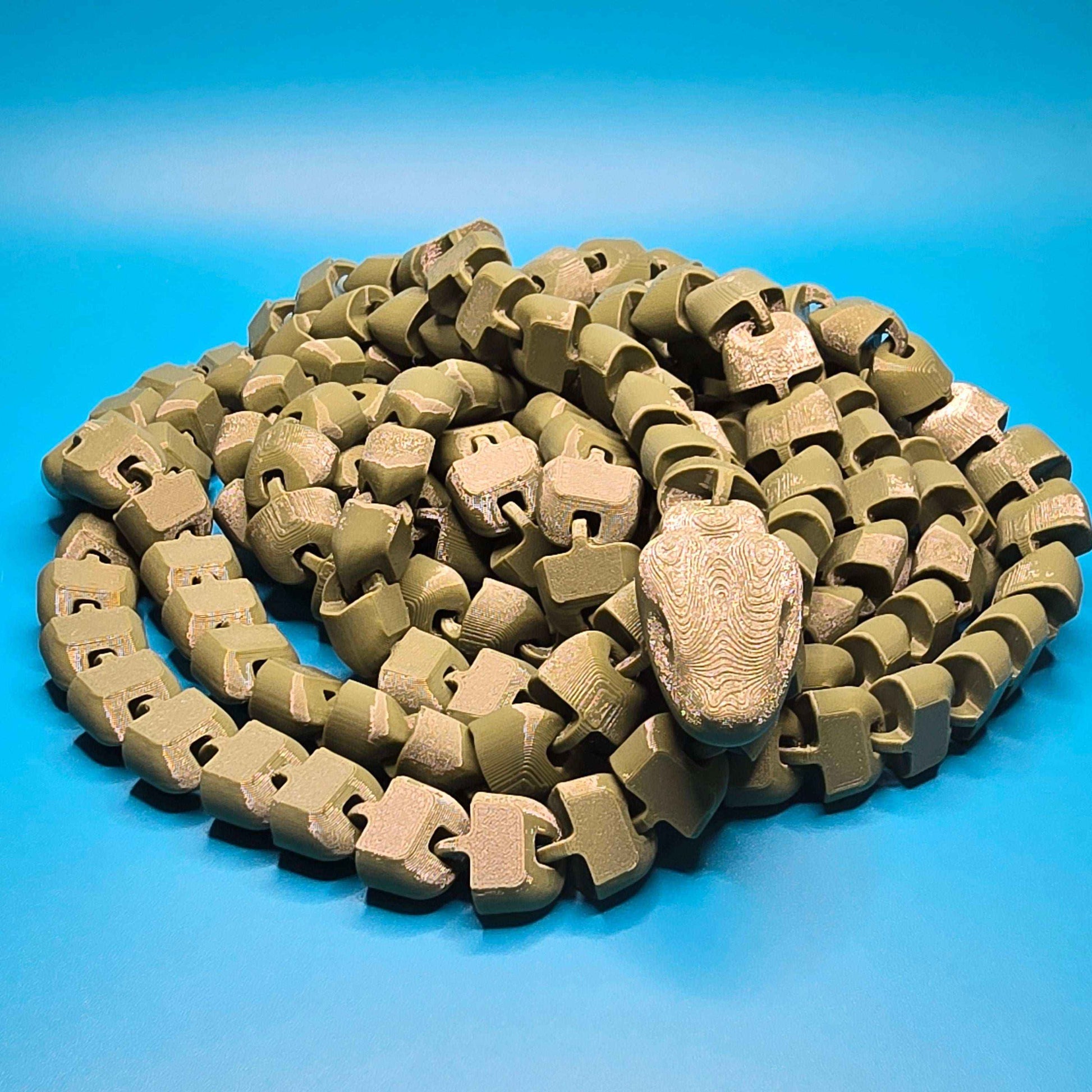 The Snek of Unreasonable Length | 10ft Articulated Snake Figurine - Impishly Yours