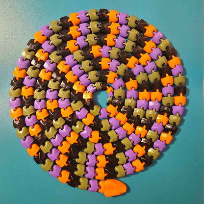 The Snek of Unreasonable Length | 10ft Articulated Snake Figurine - Impishly Yours