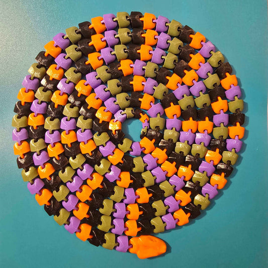 The Snek of Unreasonable Length | 10ft Articulated Snake Figurine - Impishly Yours