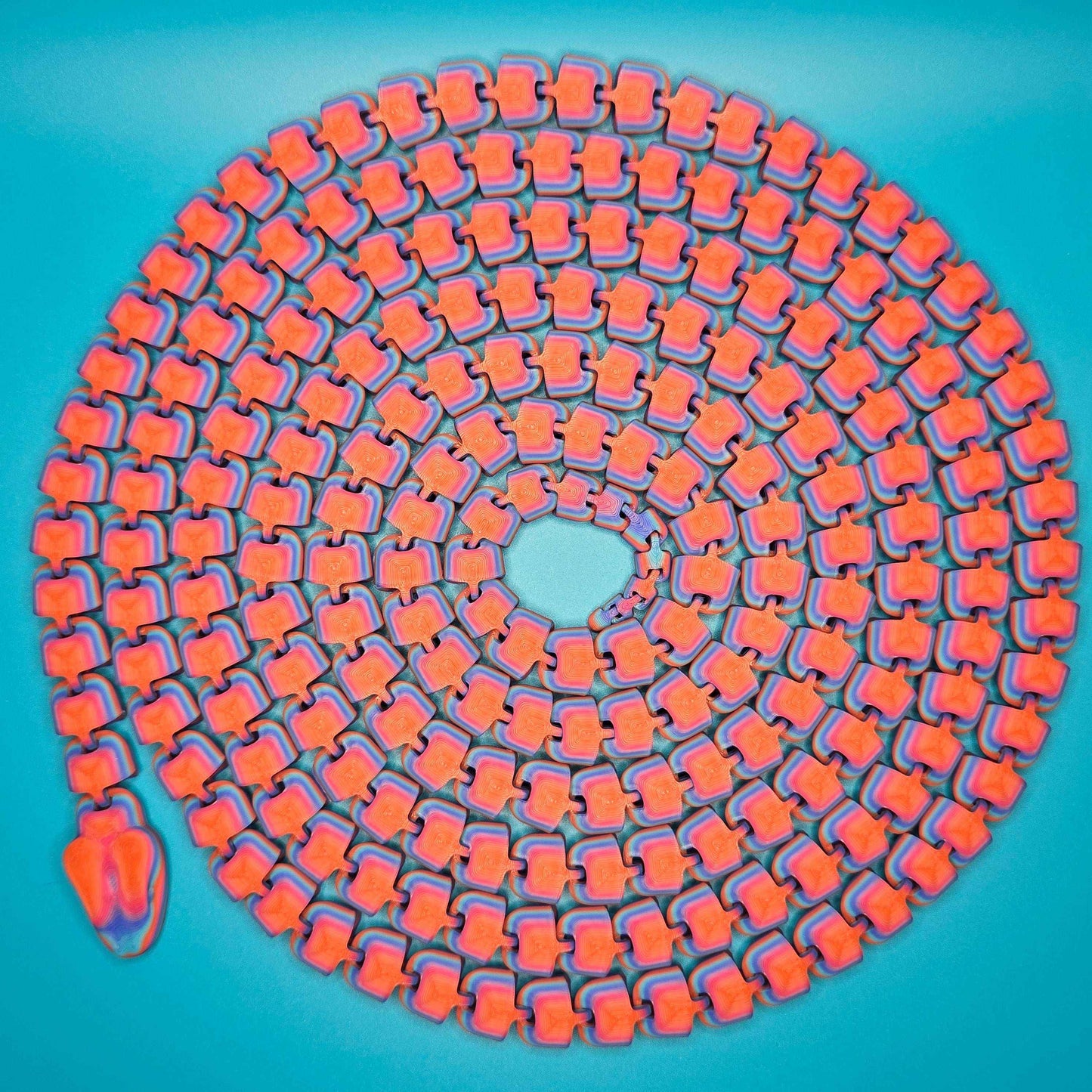 The Snek of Unreasonable Length | 10ft Articulated Snake Figurine - Impishly Yours