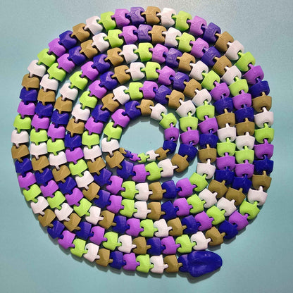 The Snek of Unreasonable Length | 10ft Articulated Snake Figurine - Impishly Yours