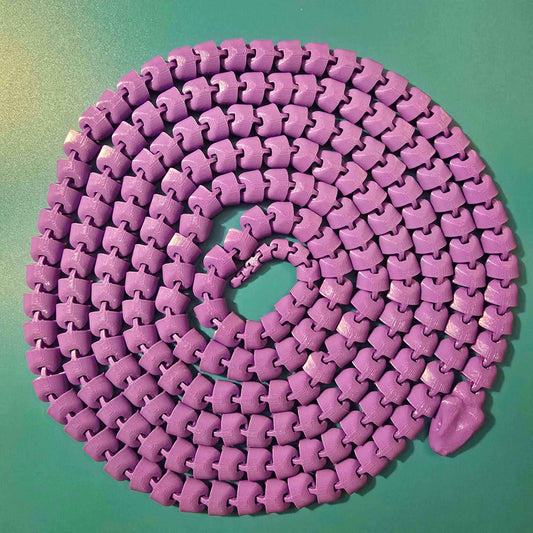 The Snek of Unreasonable Length | 10ft Articulated Snake Figurine - Impishly Yours